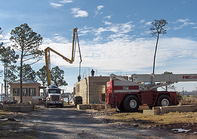 Pouring concrete into the day stack stone blocks