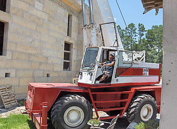 Purchased linkbelt crane to place concrete panels.