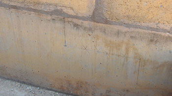 Location of concrete stairs on front wall. 