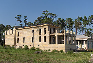 West elevationof concrete block hurricane proof home on gulf coast.