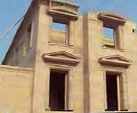 facade of Italian Style concrete block house