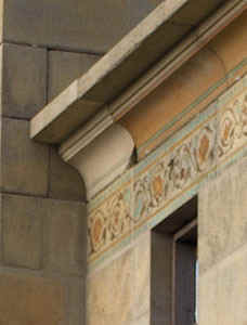 concrete cornice with chipped corner