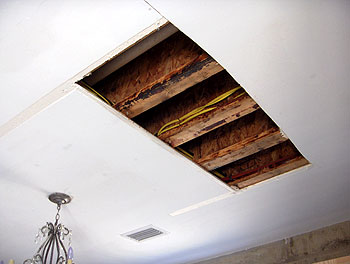 Toilet leak from upstairs-hole in ceiling