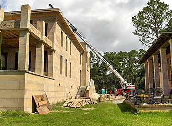 Concrete modular guesthouse and main house