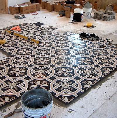 how to lay cement tile from center out