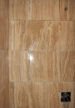 polished travertine shower walls