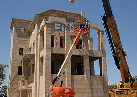 lowering the lintel into position