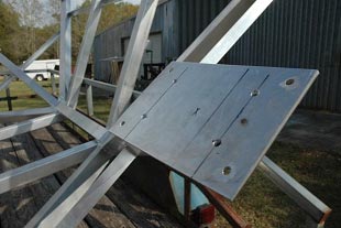 Elevator roof frame mounting plate
