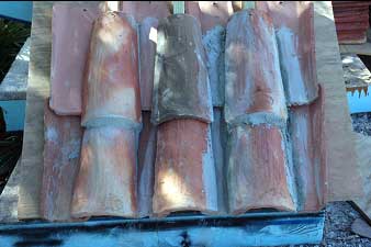 Clay roof tiles set  in cement