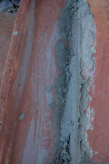 Mortar between clay roof tiles