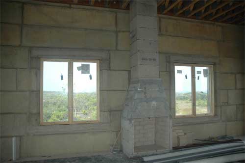 DAC ART fireplace and windows to the Gulf of Mexico