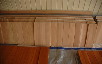 Custom garage doors, delivered unstained