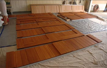 Garage door wood panels stained