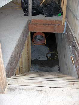 above ground basement with fan after a big rain