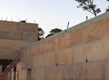 Upper walls on concrete block house.