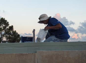 Applying HydroStop to top plate on exterior walls