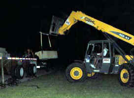Unloading the first load of concrete blocks
