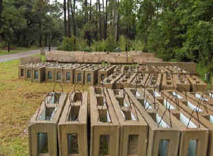 Dry stack blocks laid out in rows awaiting construction. 